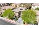An elevated view of the home showcasing the mature landscaping and roof-mounted solar panels at 3367 Popcorn Flower St, Las Vegas, NV 89117
