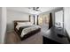 Comfortable main bedroom with neutral walls, carpet flooring, and a large bed at 3367 Popcorn Flower St, Las Vegas, NV 89117