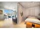 Stylish bedroom with a view of the city, concrete accent wall, and modern furnishings at 353 E Bonneville Ave # 215, Las Vegas, NV 89101