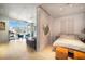 Open concept with a view of the living room, concrete accent wall, and modern furnishings at 353 E Bonneville Ave # 215, Las Vegas, NV 89101