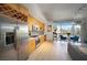 Open concept with stainless steel appliances, wood cabinets, and a view of the dining area and living room at 353 E Bonneville Ave # 215, Las Vegas, NV 89101