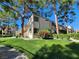 Exterior shot of a condo complex surrounded by well-maintained landscaping and sidewalks at 3750 Desert Marina Dr # 37, Laughlin, NV 89029