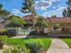 Community pool with chairs, desert landscaping, and covered picnic area at 3750 Desert Marina Dr # 37, Laughlin, NV 89029