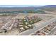 An aerial shot of a residential area with charming homes in front of a scenic river and mountain landscape at 3791 Desert Marina Dr # 109, Laughlin, NV 89029