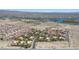 An expansive aerial view captures a community with picturesque waterways and meticulously landscaped surroundings at 3791 Desert Marina Dr # 109, Laughlin, NV 89029