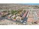 Aerial view of a desert community with red tile roofs, mature landscaping, and desert background at 3791 Desert Marina Dr # 109, Laughlin, NV 89029