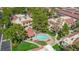 Aerial view of a charming residential community featuring a pool, mature trees, and well-maintained landscaping at 3791 Desert Marina Dr # 109, Laughlin, NV 89029