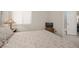 Bedroom with carpeted floors, neutral decor, and access to the ensuite bathroom at 3791 Desert Marina Dr # 109, Laughlin, NV 89029