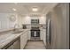 Bright kitchen with stainless steel appliances, white cabinets and stylish countertops at 3791 Desert Marina Dr # 109, Laughlin, NV 89029