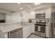 Well-lit kitchen featuring stainless steel appliances, updated cabinets, and countertops at 3791 Desert Marina Dr # 109, Laughlin, NV 89029