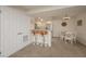 A view of the condo kitchen and dining area, featuring neutral color palette at 3791 Desert Marina Dr # 109, Laughlin, NV 89029