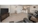 Open living room with bar seating and view into dining and kitchen at 3791 Desert Marina Dr # 109, Laughlin, NV 89029