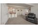 Open living room with breakfast bar and view into bedroom at 3791 Desert Marina Dr # 109, Laughlin, NV 89029