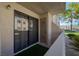 Private patio with sliding glass doors and additional storage space at 3791 Desert Marina Dr # 109, Laughlin, NV 89029