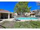 Sparkling community pool and well-manicured grounds create a relaxing oasis at 3791 Desert Marina Dr # 109, Laughlin, NV 89029