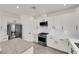 Well-lit kitchen with stainless steel appliances, white cabinets, and modern fixtures for a clean, contemporary look at 3846 Biltmore Bay St, Las Vegas, NV 89147