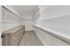 Organized walk-in closet with built-in shelving and drawers for ample storage and easy organization at 3846 Biltmore Bay St, Las Vegas, NV 89147