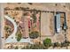 Overhead aerial view of desert house featuring an equestrian area at 4075 W Torino Ave, Las Vegas, NV 89139