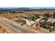 Spacious property with a long driveway and mountain views in a serene desert setting at 4075 W Torino Ave, Las Vegas, NV 89139