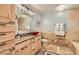Stylish bathroom features a vessel sink, granite countertop, and modern fixtures at 4075 W Torino Ave, Las Vegas, NV 89139