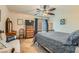 Charming bedroom with ceiling fan, comfortable bed, and decor, creating a cozy and inviting space at 4075 W Torino Ave, Las Vegas, NV 89139