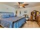 Inviting bedroom with a comfortable bed, decorative pillows, and ample space at 4075 W Torino Ave, Las Vegas, NV 89139