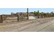 Desert property featuring wooden fence and private drive way at 4075 W Torino Ave, Las Vegas, NV 89139