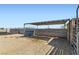 Open horse paddock with shelter, providing a safe and comfortable outdoor space for livestock at 4075 W Torino Ave, Las Vegas, NV 89139