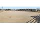 Large horse riding arena with well-maintained sand, and views of the surrounding landscape at 4075 W Torino Ave, Las Vegas, NV 89139