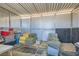Spacious horse stall with metal bars, hay, and adequate storage for a comfortable equine living space at 4075 W Torino Ave, Las Vegas, NV 89139