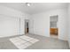 Bright bedroom features neutral walls, carpet, and an ensuite bath at 4076 Rocky Beach Dr, Las Vegas, NV 89115