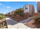 Inviting walkway lined with desert landscaping offering a serene approach to these lovely townhomes at 4076 Rocky Beach Dr, Las Vegas, NV 89115