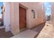 Exterior side view with walkway leading to front door, showing well-kept facade and outdoor lighting at 4076 Rocky Beach Dr, Las Vegas, NV 89115