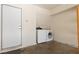 Garage features a washer and dryer at 4076 Rocky Beach Dr, Las Vegas, NV 89115