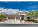 Charming single-story home showcasing a well-maintained yard, tile roof, and a spacious three-car garage at 4334 Libbiano Ct, Las Vegas, NV 89141