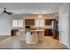 Bright kitchen features stainless appliances, dark wood cabinets, and center island at 4334 Libbiano Ct, Las Vegas, NV 89141