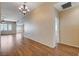 An open living space showcases wood-look flooring, recessed lighting, and plenty of room for entertaining at 4334 Libbiano Ct, Las Vegas, NV 89141