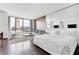 Contemporary bedroom featuring a plush bed, city views, and integrated living area with stylish decor at 4381 W Flamingo Rd # 1102/1104, Las Vegas, NV 89103