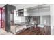 This modern kitchenette features stainless steel appliances, sleek wood counters, and ample storage space at 4381 W Flamingo Rd # 1102/1104, Las Vegas, NV 89103