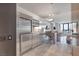 Open-concept kitchen with stainless steel appliances, ample cabinetry, and a seamless transition to the living area at 4381 W Flamingo Rd # 1102/1104, Las Vegas, NV 89103