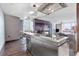Contemporary kitchen showcasing a stainless steel island with bar seating at 4381 W Flamingo Rd # 1102/1104, Las Vegas, NV 89103