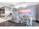 Stylish kitchen featuring a stainless steel island, modern appliances, and barstool seating at 4381 W Flamingo Rd # 1102/1104, Las Vegas, NV 89103