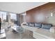 Comfortable living room showcases city views, modern decor, and a relaxing seating arrangement at 4381 W Flamingo Rd # 1102/1104, Las Vegas, NV 89103