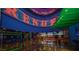Casino interior featuring decorative ceiling lights, lounge areas and bar at 4381 W Flamingo Rd # 2302, Las Vegas, NV 89103
