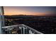 Balcony view of the city skyline at dusk with distant mountains on the horizon at 4381 W Flamingo Rd # 2302, Las Vegas, NV 89103