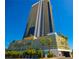 Striking exterior view of the high-rise building set against a clear blue sky at 4381 W Flamingo Rd # 2302, Las Vegas, NV 89103