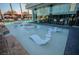 Unique pool with submerged lounge chairs and views of the bar at 4381 W Flamingo Rd # 2302, Las Vegas, NV 89103