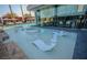 Relaxing pool area with unique in-water seating and stylish lounge chairs at 4381 W Flamingo Rd # 2302, Las Vegas, NV 89103