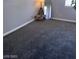 Spacious bedroom featuring neutral colored walls and carpeting at 4965 Indian River Dr # 101, Las Vegas, NV 89103