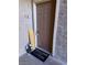 A welcoming entryway features a welcome mat and decorative accents, setting a warm tone at 4965 Indian River Dr # 101, Las Vegas, NV 89103